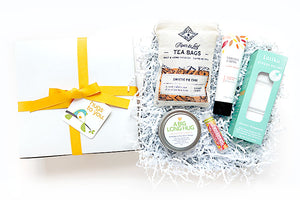 A BIG LONG HUG HUG BOX. Deliver a Big Long Hug to your loved one with this meaningful gift. Show them that you are thinking of them with a Hug Box filled with locally made artisan goods that are sure to bring a smile to their face.