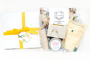 This Hug Box allows you to give the gift of A Day at the Spa, complete with locally crafted artisan treats for a rejuvenating and joyful experience. It's a wonderful option for get well gift, birthday gift, employee or client gift, self-care gift, Valentine's Day gift, or simply to show someone you are thinking about them.