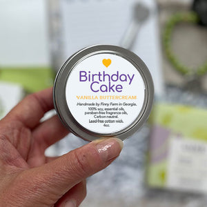 BIRTHDAY CAKE CANDLE - 100% soy. Non-toxic. Carbon-neutral. Lead-free cotton wick. Made with essential oils and paraben-free fragrance oils to fill the room with vanilla and buttercream. Hand-poured into a travel tin with lid. Handmade by Finny Farm in Georgia.