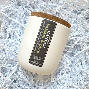 BALSAM PINE SOY CANDLE - 100% soy candle. Handmade by Turnrow Bath, Body &amp; Home in Georgia. Comes in cream colored ceramic container with cork lid that can be reused as a planter or holder for treasures. 10 oz. 30 hr + burn time. Women-owned small business.