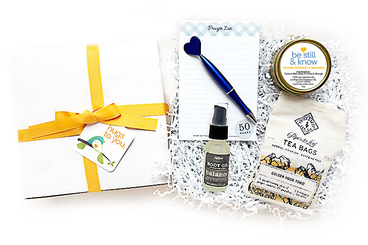 BE STILL AND KNOW HUG BOX GIFT -Send a hug to bring stillness and comfort. A meaningful gift for get well, sympathy, thinking of you. Filled with products created by local Georgia artisans, woman-owned small businesses and the nonprofit, Thistle Farms. A gift the gives back.