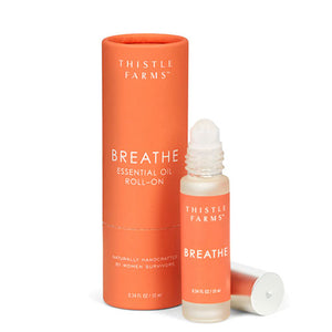 BREATH ESSENTIAL OIL ROLL-ON - Breathe in the refreshing aroma of our Eucalyptus Peppermint "Breathe" blend. This invigorating fusion of Eucalyptus smithii, Niaouli, Peppermint, and Frankincense clears airways and minimizes seasonal threats, promoting a sense of clarity and well-being. Made by the women of the Thistle Farms in Tennessee. A&nbsp;nonprofit that provides women safe havens for healing, combining secure housing, meaningful employment, and lifelong sisterhood. 10 ml