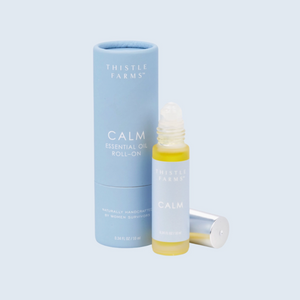 CALM ESSENTIAL OIL ROLL-ON - They'll unwind with this essential oil blend, a grounding combination that inspires serenity, soothes anxiety, and fosters tranquility. Its soft citrus notes and sweet, earthy aroma create a harmonious sensory experience. Elevate a self-care routine with the natural goodness of Orange Vanilla Patchouli. Made by the women of the nonprofit, Thistle Farms, a safe haven for healing, combining secure housing, meaningful employment, and lifelong sisterhood, in Tennessee. Roll-on. 10ml