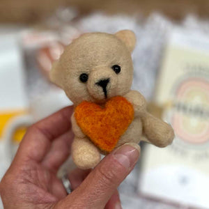 Hug Bear Handmade with felt by Traycee Made in Georgia. This sweet bear will give them hugs everyday.