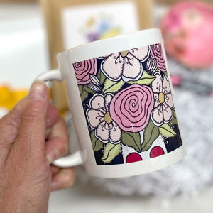 FLORAL MUG - This whimsical and joyful bouquet illustration was created by Pick it Place Designs in Georgia. Dishwasher and microwave safe. 11 oz. Ceramic.
