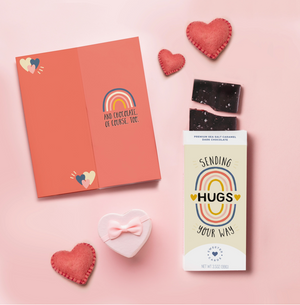 SENDING HUGS CHOCOLATE&nbsp;- A greeting card and chocolate bar ALL IN ONE (we will sign your name on it), Woman-owned. Fair Trade Certified. Ethically Sourced. Each bar is made with soft vanilla caramel, cane sugar, fresh whipping cream, butter and Madagascar vanilla––and always topped with Mediterranean sea salt. Chocolatier uses only the finest clean ingredients, and has no artificial flavors or colors, no preservatives and no hydrogenated oils.&nbsp;Made by Sweeter Cards in Missouri.