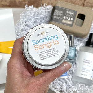 A little toast of subtle fruity sparkling sangria. 100% soy. Non-toxic. Carbon-neutral. Lead-free cotton wick. Made with essential oils and paraben-free fragrance oils.Hand-poured into a travel tin with lid. Handmade by Finny Farm in Georgia. 4oz.