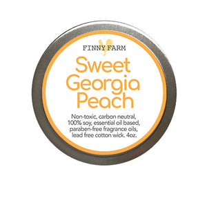 SWEET PEACH CANDLE - 100% soy. Non-toxic. Carbon-neutral. Lead-free cotton wick. Made with essential oils and paraben-free fragrance oils for a sweet peachy nectar scent. Hand-poured into a travel tin with lid. Handmade by Finny Farm in Georgia.