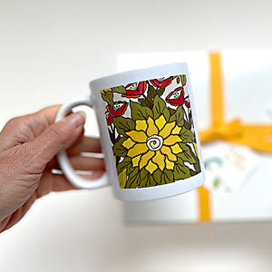 FLORAL BOTANICAL MUG - A great way to start or finish the day with a happy and healthy cup of tea. Artwork by Pick it Place Designs in Georgia. Ceramic. Dishwasher and microwave safe. 11 oz.