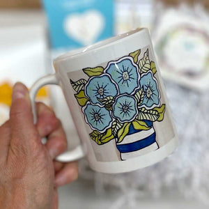 FLORAL MUG&nbsp;- An uplifting way to start the day with their favorite beverage. Original acrylic painting created by Pick it Place Designs in Georgia and printed on mug. Ceramic. Dishwasher and microwave safe. 11oz.