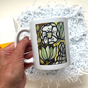 BOTANICAL MUG - They will love this beautiful mug to start their day.&nbsp;Illustration by Pick it Place Designs in Georgia. Dishwasher and microwave safe. 11 oz. Ceramic.