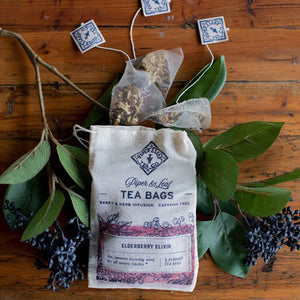 ELDERBERRY ELIXIR TEA - An immune boosting tonic for all-season vitality. This berry and herb infusion containing elderberries and echinacea is a favorite. Packaged in a hand-printed muslin bag, containing 9 pyramid sachets of tea ready to brew and waiting for you. All natural ingredients; Elderberries, Ginger, Lemon Rind, Hibiscus, Cinnamon, Echinacea, Licorice, Cloves. Handcrafted by Piper and Leaf in Alabama.