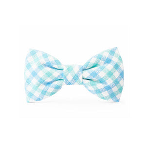 DOG BOW TIE - Removable bow tie gives an extra dose of dapper when you need it. Slides onto most standard-width collars with elastic loops on the back. Two loops for added stability (no more bow tie droop!). Created by the Foggy Dog in California. For every order placed with The Foggy Dog, they provide a pound of food to rescue shelters across the country.