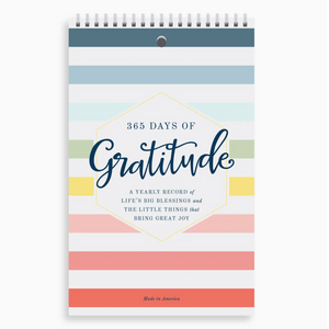 GRATITUDE JOURNAL - The simple format of one-line-a-day gratitude journal leads users to give thanks for life's big blessings and the little things that bring great joy. Each monthly page includes a Bible verse and room for recording a prayer of thanksgiving on the back. Item Details: 5x8 inches. Spiral-bound. Printed on heavy, 130# white card stock. Designed in Mississippi. Made in Mississippi by Muscadine Press. Comes with Hug Box Heart pen.