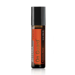 dōTERRA ON GUARD ESSENTIAL OIL ROLL-ON - Apply to the chest and bottoms of the feet for an energizing, uplifting aroma. Perfect for all ages, it blends Wild Orange, Clove, Cinnamon Bark, Eucalyptus, and Rosemary essential oils—all known for their skin-purifying properties. For more information visit doterra.com. 10ml 