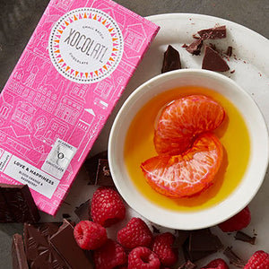 LOVE & HAPPINESS DARK CHOCOLATE BAR - Blood orange infused olive oil &amp; dried raspberries swirled in dark chocolate the kind of sweet and fruity dark chocolate that will have them feeling nothing but love and happiness. All natural Ingredients. Made by Xocolatl Small Batch Chocolate in Georgia. Small family-owned. Dairy free, Faire Trade. Plant-based. Vegan. Photo credit: xocoatl 