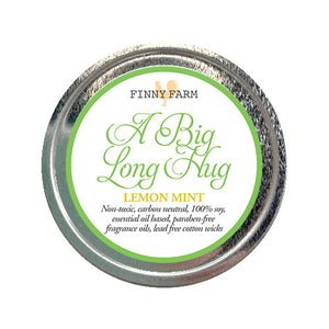 LEMON MINT CANDLE - 100% soy. Non-toxic. Carbon-neutral. Lead-free cotton wick. Made with essential oils and paraben-free fragrance oils for a soothing mood. Hand-poured into a travel tin with lid. Handmade by Finny Farm in Georgia.4oz.
